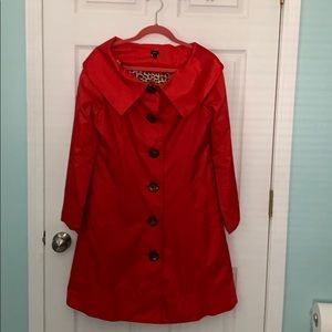 Aziz Red trenchcoat.